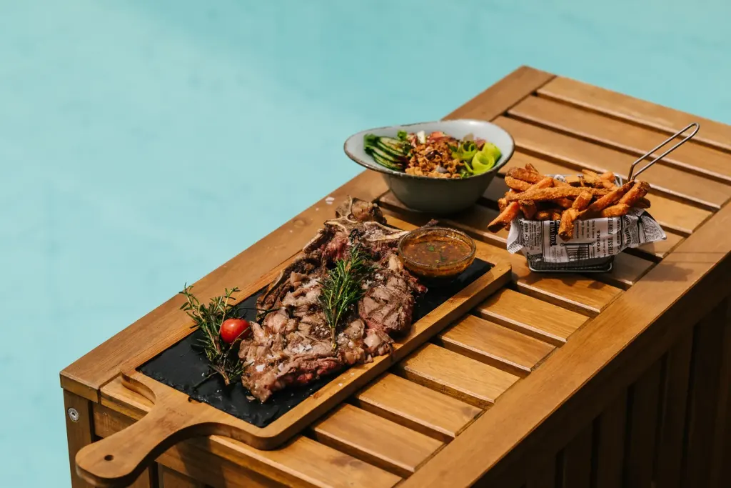 Grilled meat board at the beach club restaurant in Marbella