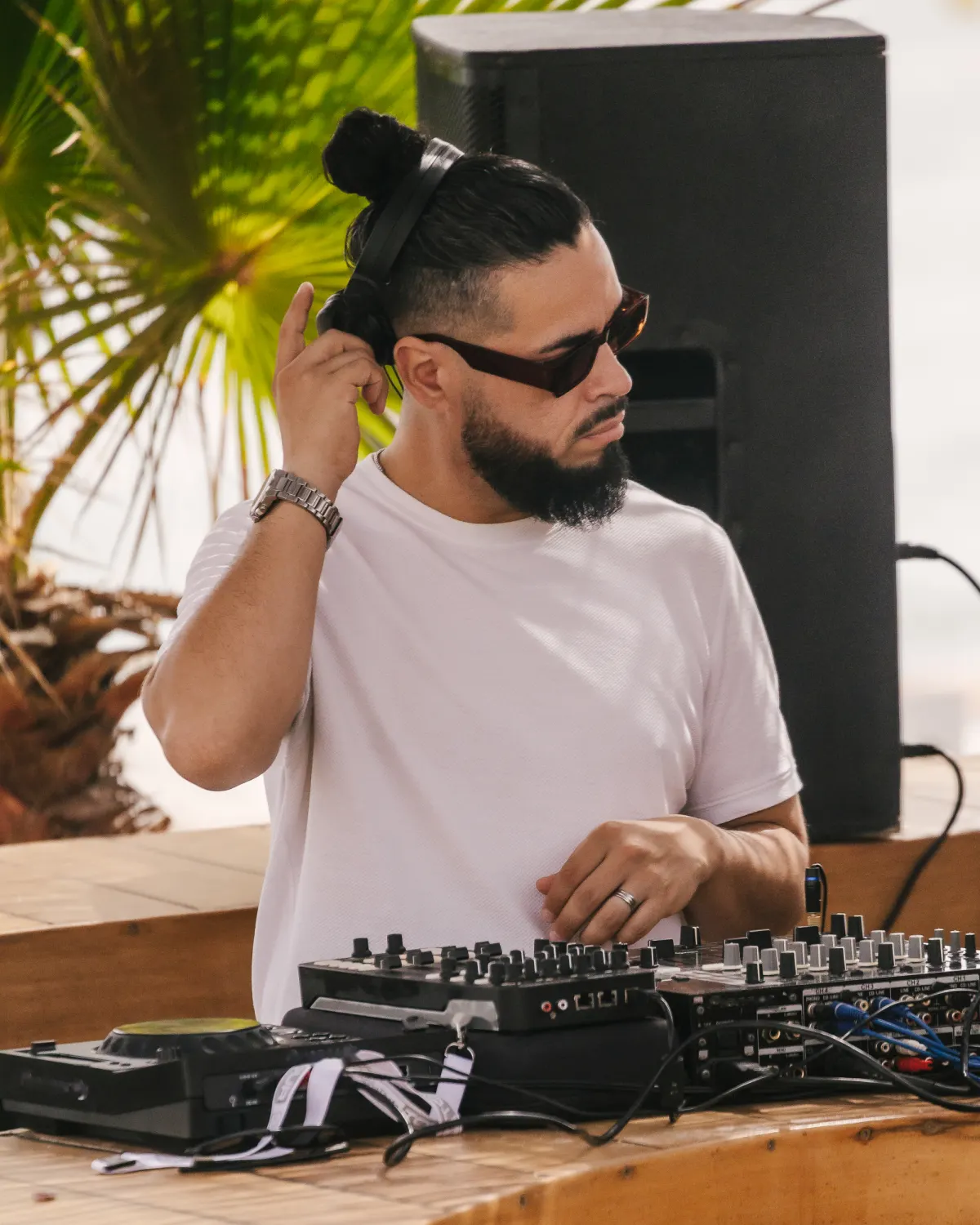 DJ playing the sunset session at the beach club in Marbella