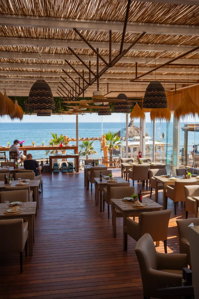 Restaurant dining room with sea views at The Point Marbella